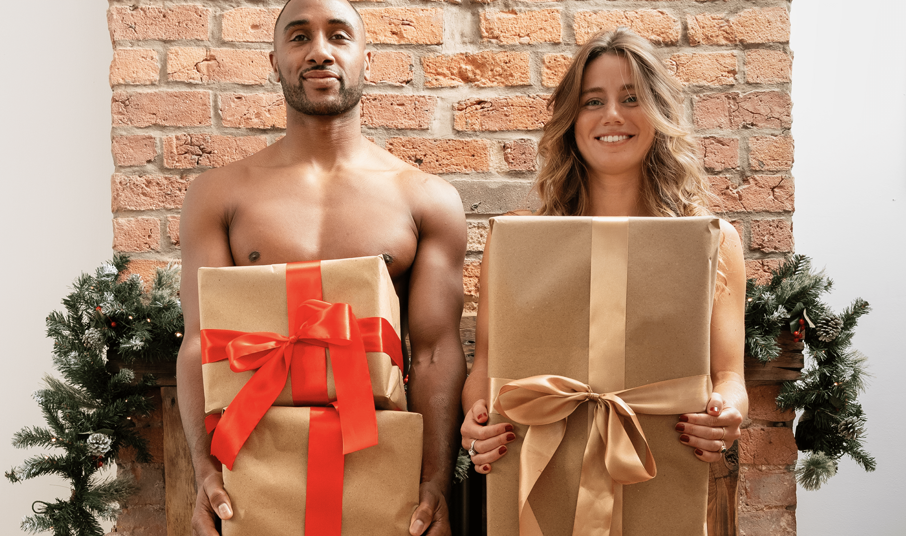 2 people in underwear holding presents